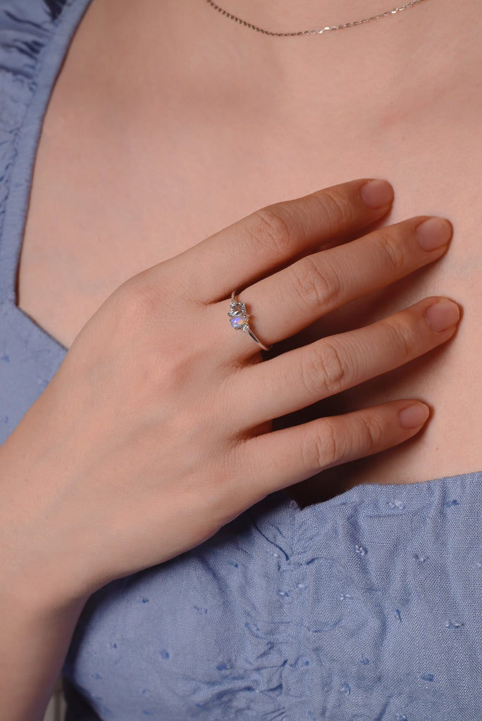 model-wearing-aquamarine-opal-ring-in-sterling-silver