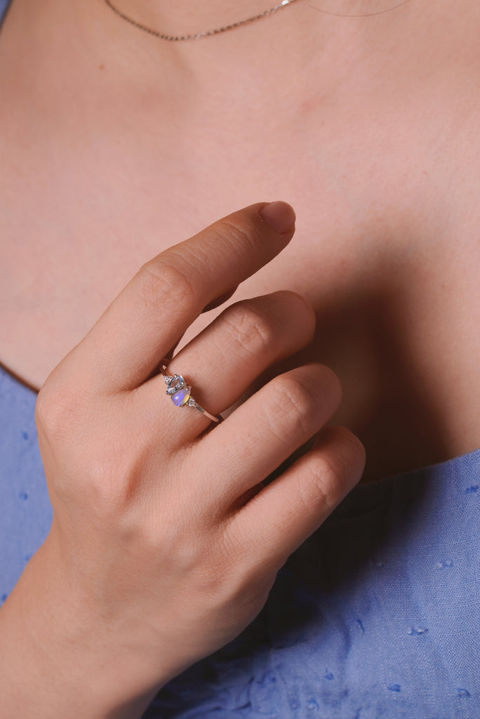 Model wearing Aquamarine Opal Ring in Sterling Silver
