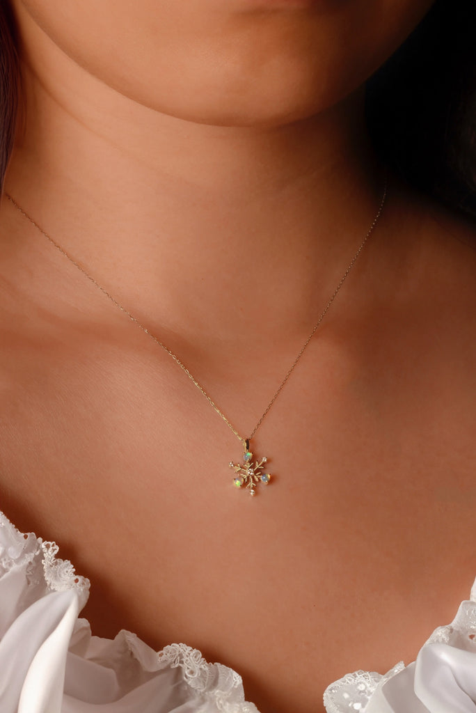 Model wearing a Snowflake Opal Necklace with Diamonds in Yellow Gold
