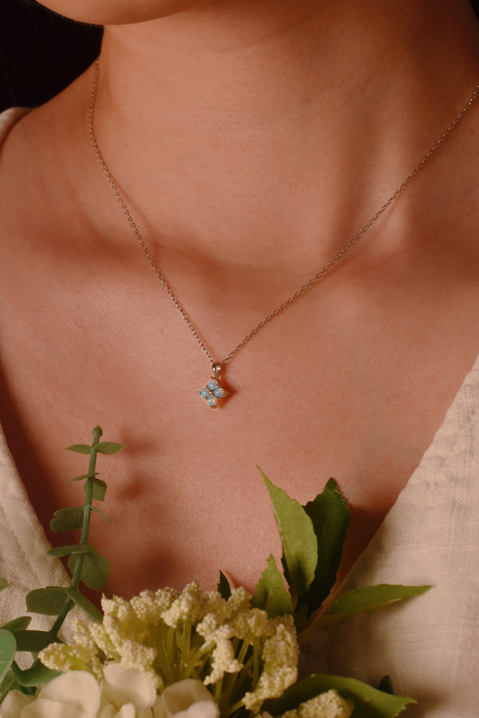 Model wearing Clover Opal Necklace in White Gold, Blue