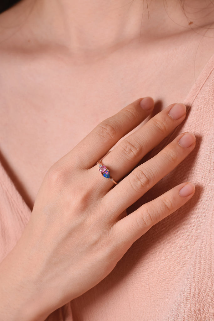 Model wearing Elysia Opal Ring with Pink Sapphire and Diamonds in Rose Gold