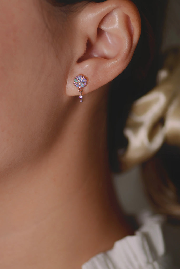 Model wearing Hanabi Opal Earrings with Diamonds in Yellow Gold
