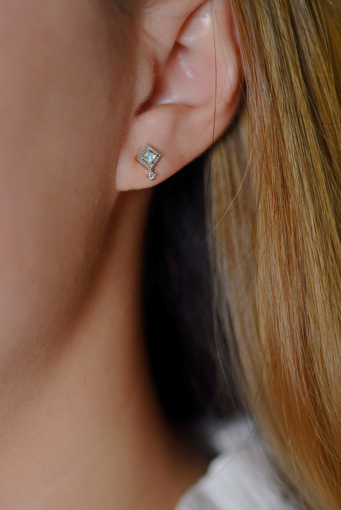 Model wearing Kite Opal Earrings with Diamonds in White Gold