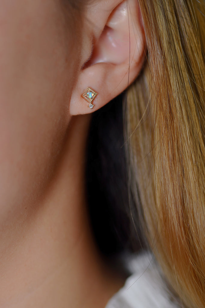 Model wearing Kite Opal Earrings with Diamonds in Yellow Gold