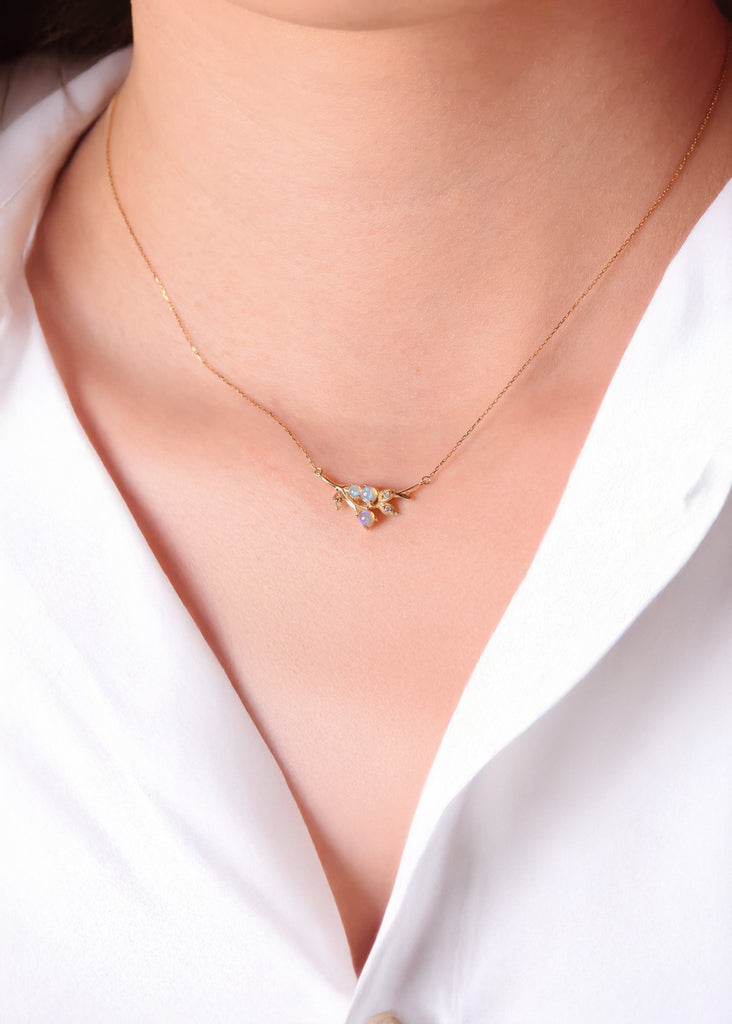 Model Wearing Miyu Branch Opal Necklace with Diamonds in Yellow Gold
