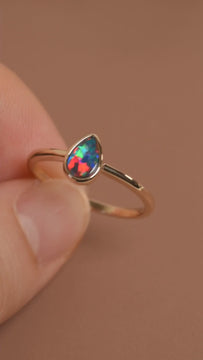 Teardrop Opal Ring in Yellow Gold, Red Doublet - Mood Shot Video
