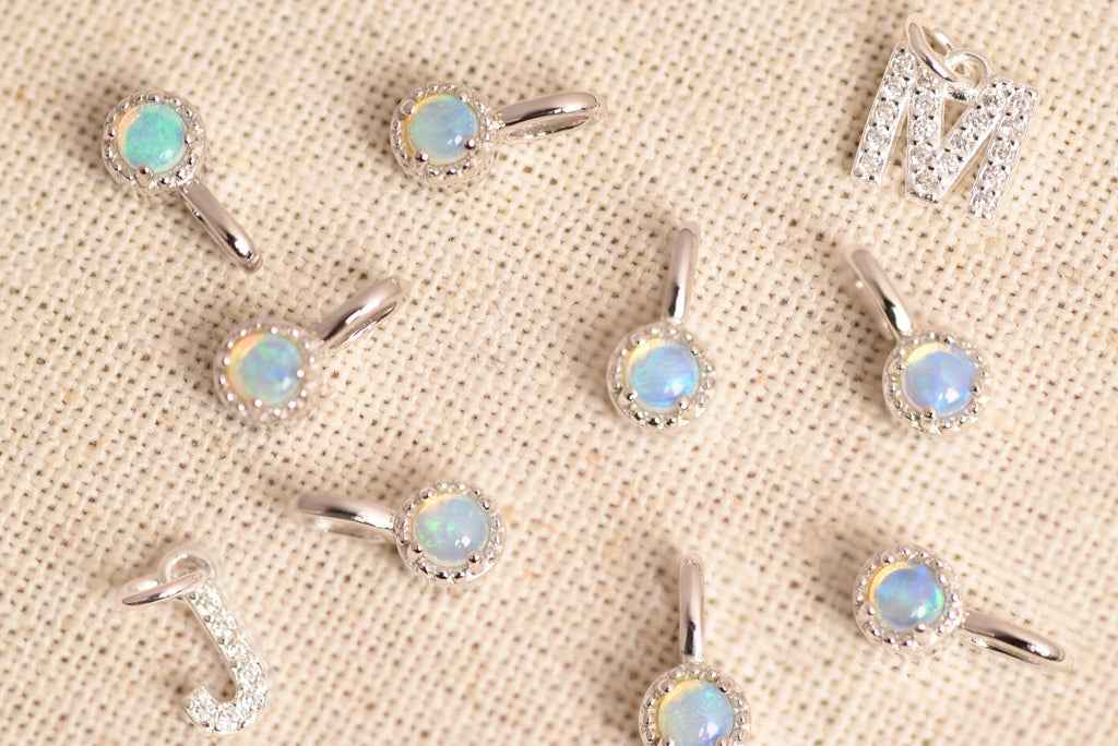 Silent Opal Pendants with Initials in Sterling Silver, Really Small - Mood Shot