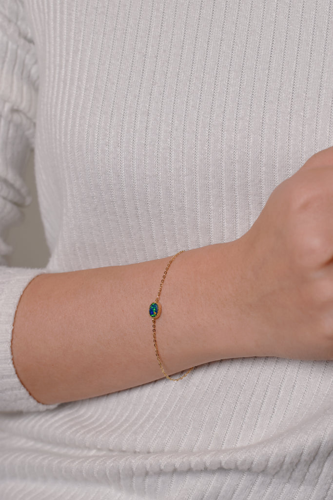 Oval Doublet Opal Bracelet in Yellow Gold on wrist