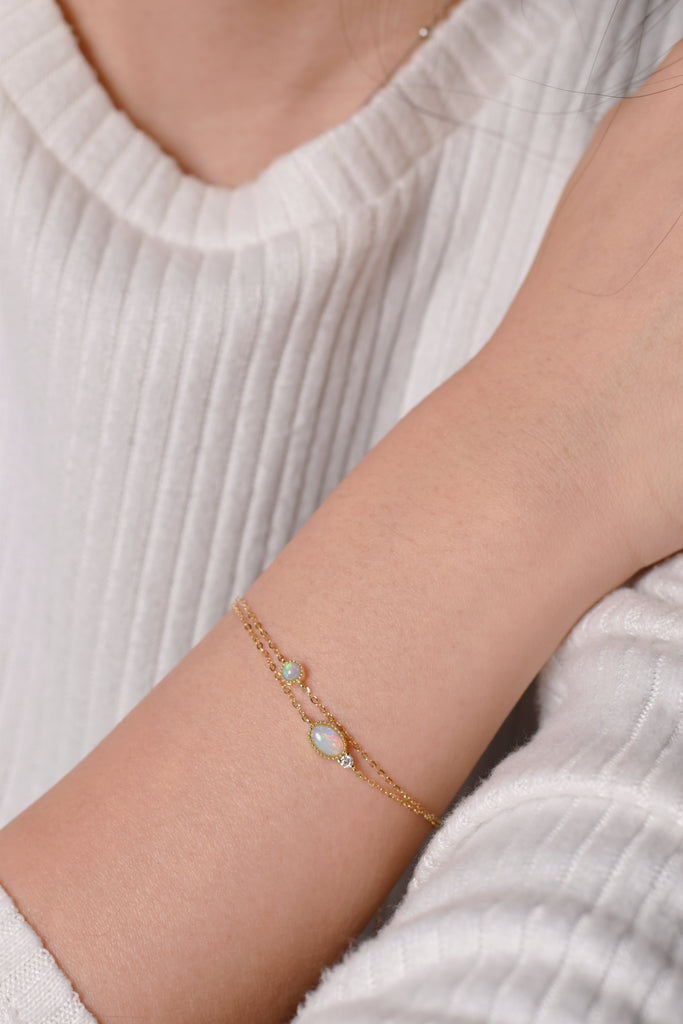 Oval Opal Bracelet with Diamond in Yellow Gold