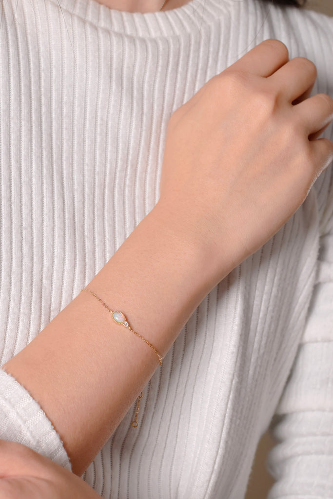 Oval Opal Bracelet with Diamond in Yellow Gold