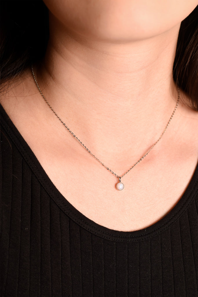 Model wearing Bliss White Opal Necklace in Sterling Silver