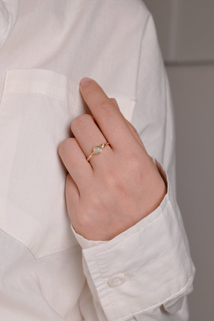 Model wearing Bubble Opal Ring with Diamond in Yellow Gold