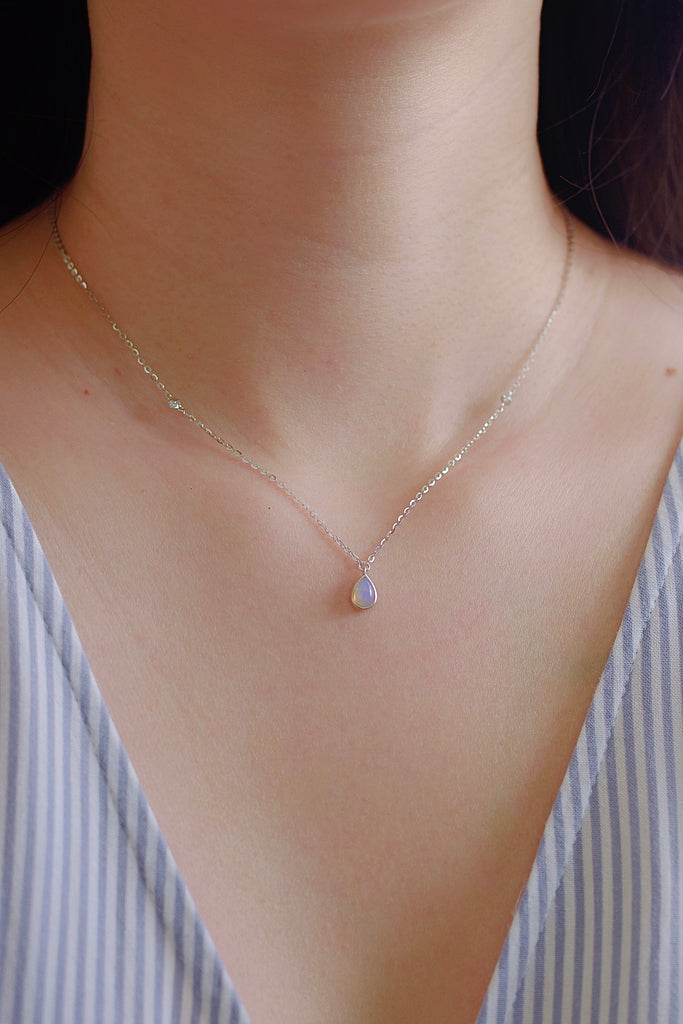 Model wearing Drop Opal Necklace in Sterling Silver