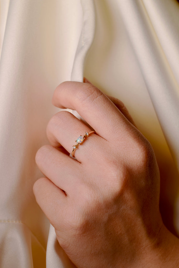 Model wearing Gemini Opal Ring with Diamonds in Yellow Gold