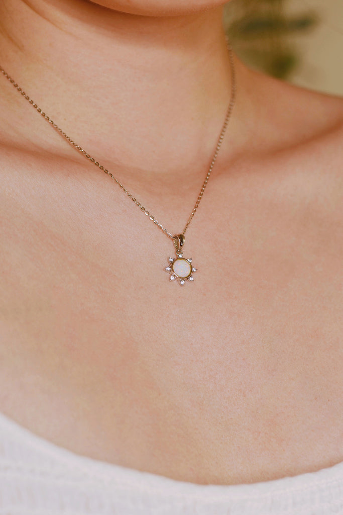 Model wearing Little Sun Opal Necklace in Sterling Silver, White 