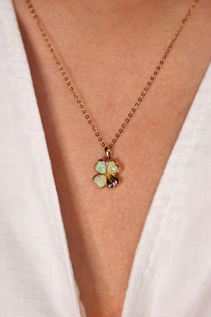 Model wearing Luck² Opal Necklace in Yellow Gold