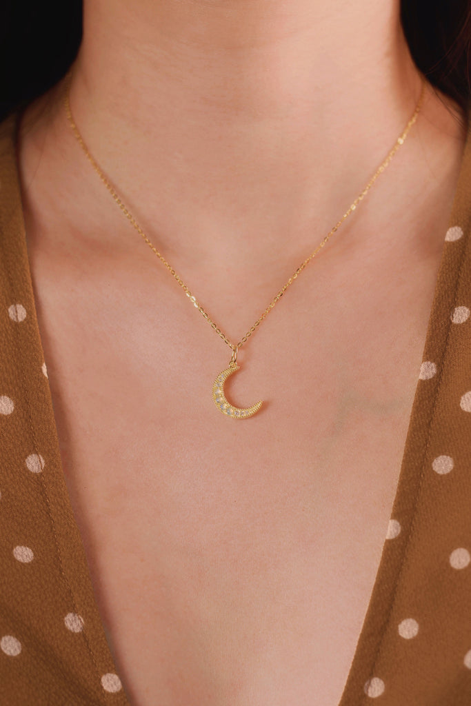 
Model wearing Luna Opal Necklace in Sterling Silver, Yellow Gold Plated