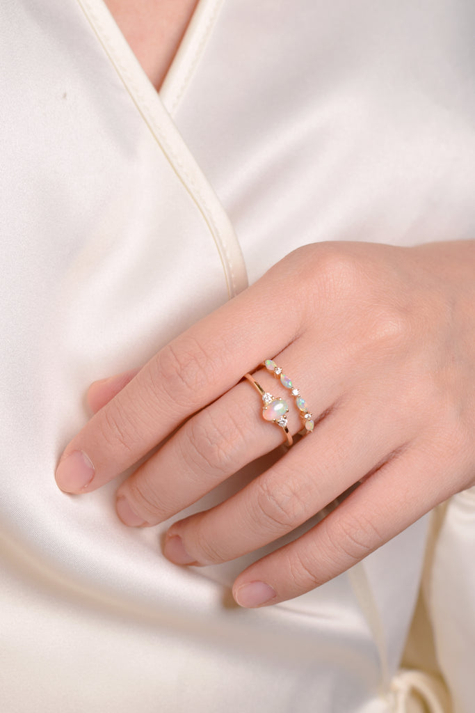 Model wearing Marquise Opal Band Ring with Diamonds in Yellow Gold, stackable