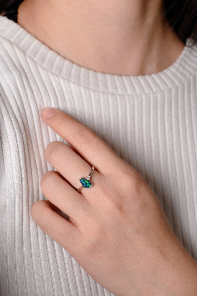 Model wearing Prather Opal Ring with Diamond in White Gold