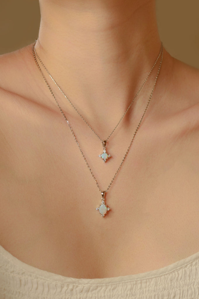 Model wearing Starlike Opal Necklaces