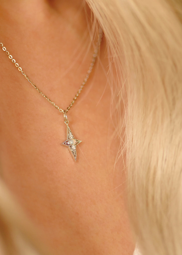 Model wearing The Star of Bethlehem Opal Necklace in Sterling Silver