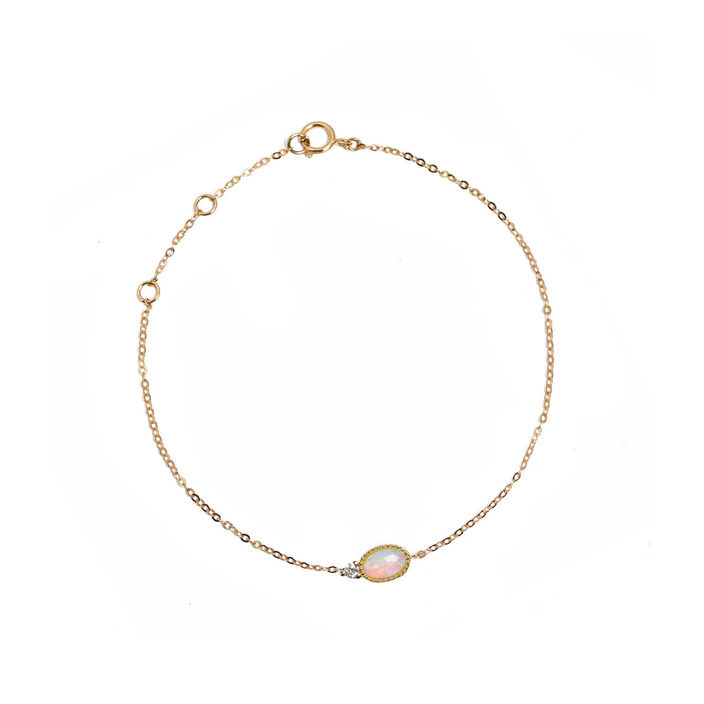 Oval Opal Bracelet with Diamond in Yellow Gold