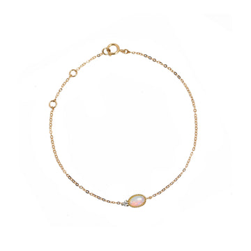 Oval Opal Bracelet with Diamond in Yellow Gold